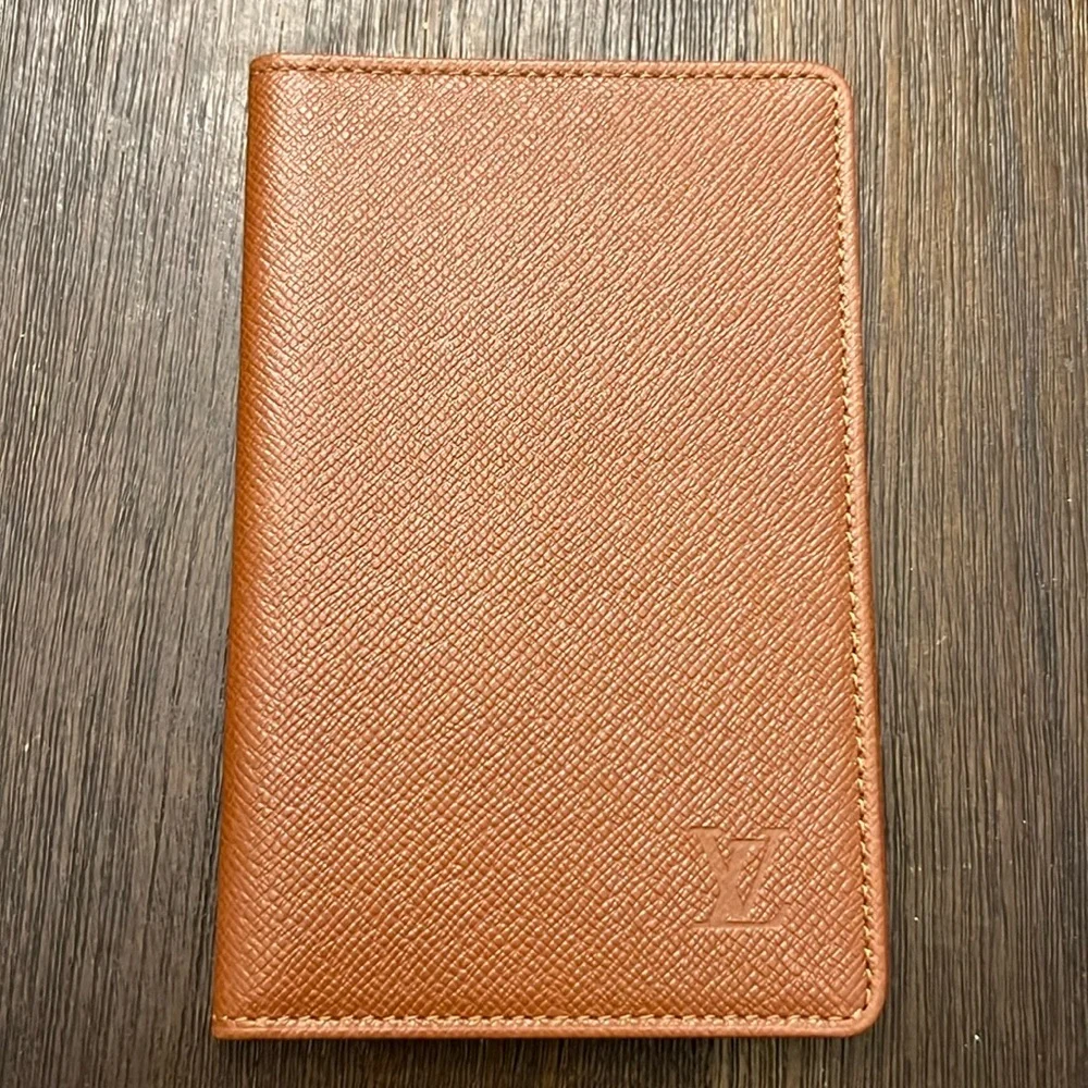 Authentic Louis Vuitton brown taiga leather bifold card I.D. Holder
